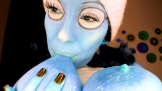 Smurfette cosplayer sucking on her massive tits and flashing her pussy